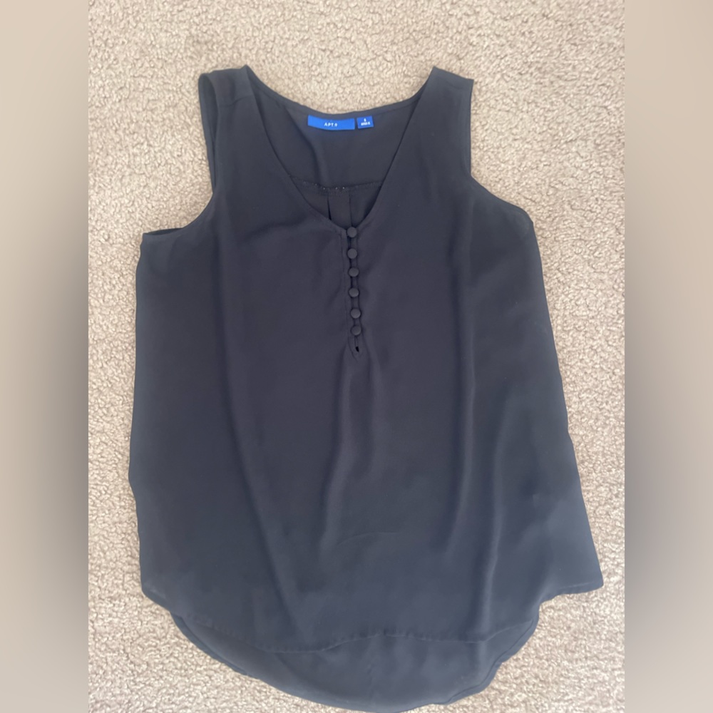 Black woman’s sleeveless blouse